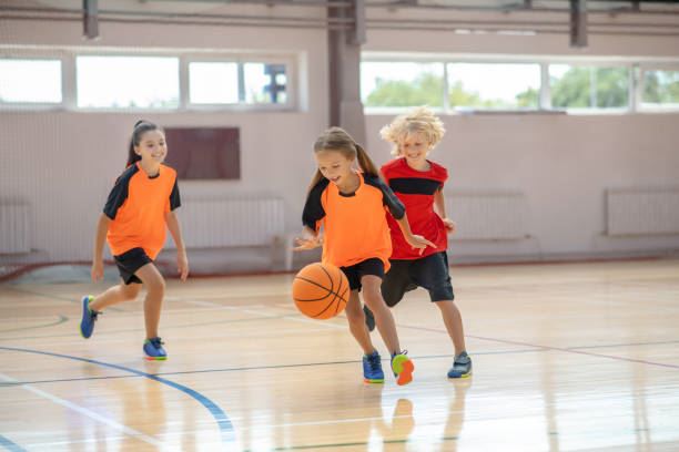Kids playing basketball